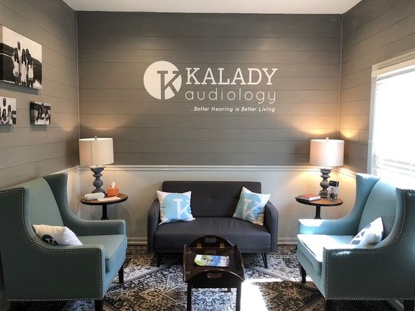 The Kalady Audiology waiting room with armchairs and a sofa