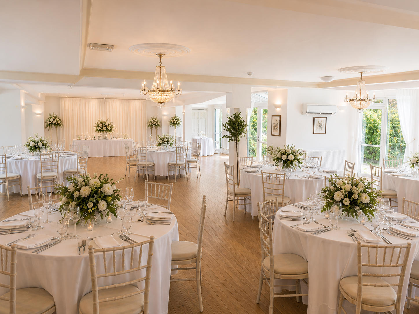 Banquet hall with round tables set for a formal event