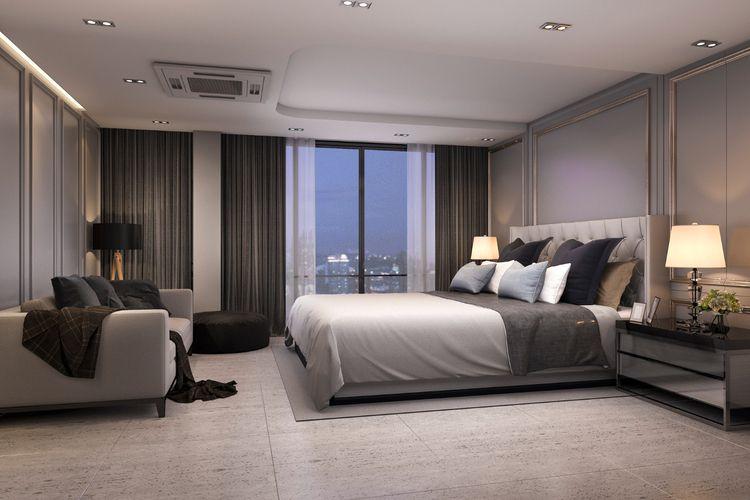 Hotel bedroom with a large bed and a city view