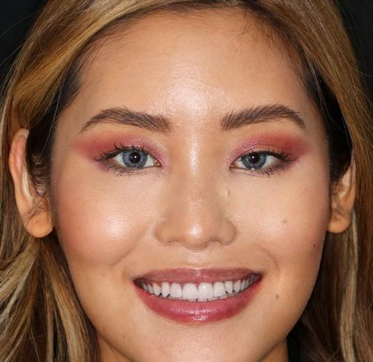 Close-up portrait of a smiling woman