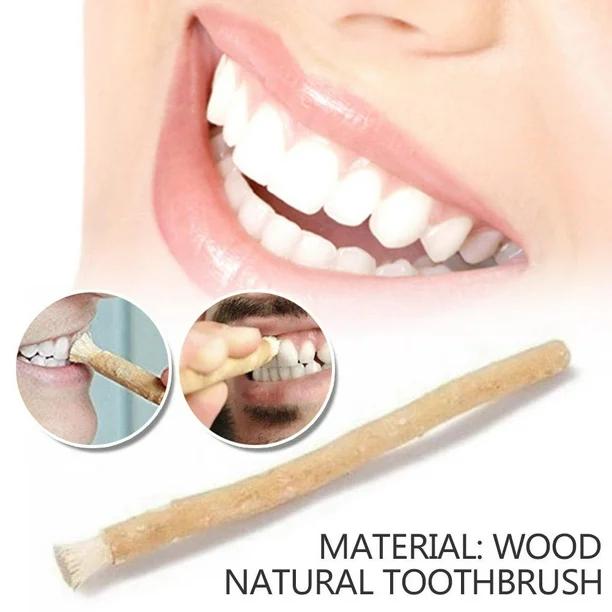 Miswak chewing stick beside a smiling mouth