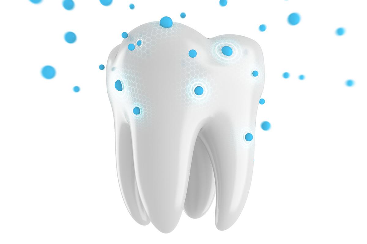 White 3D molar model surrounded by blue dots
