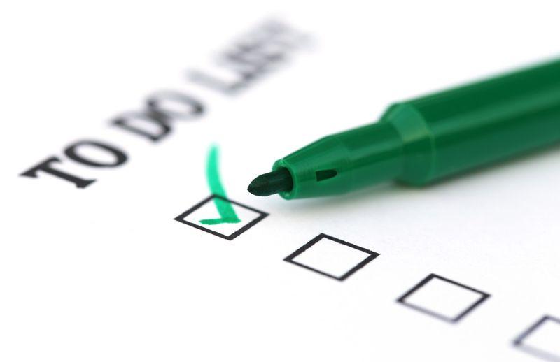 Checklist with one ticked box and a green marker