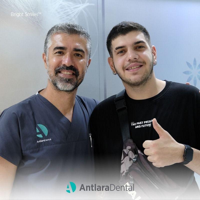 Patient After Peridontal Treatment dentist and patient smiles after having Periodontal Treatments in Turkey