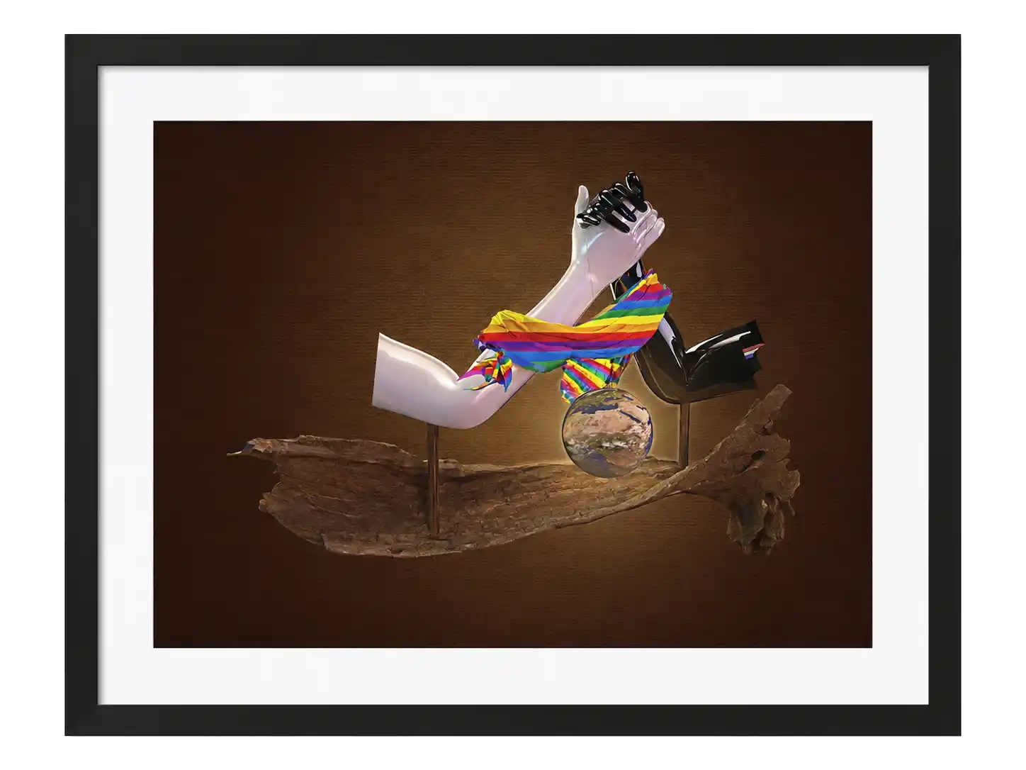 3D digital art of black and white hands joined with rainbow fabric above a small globe on a wooden form.