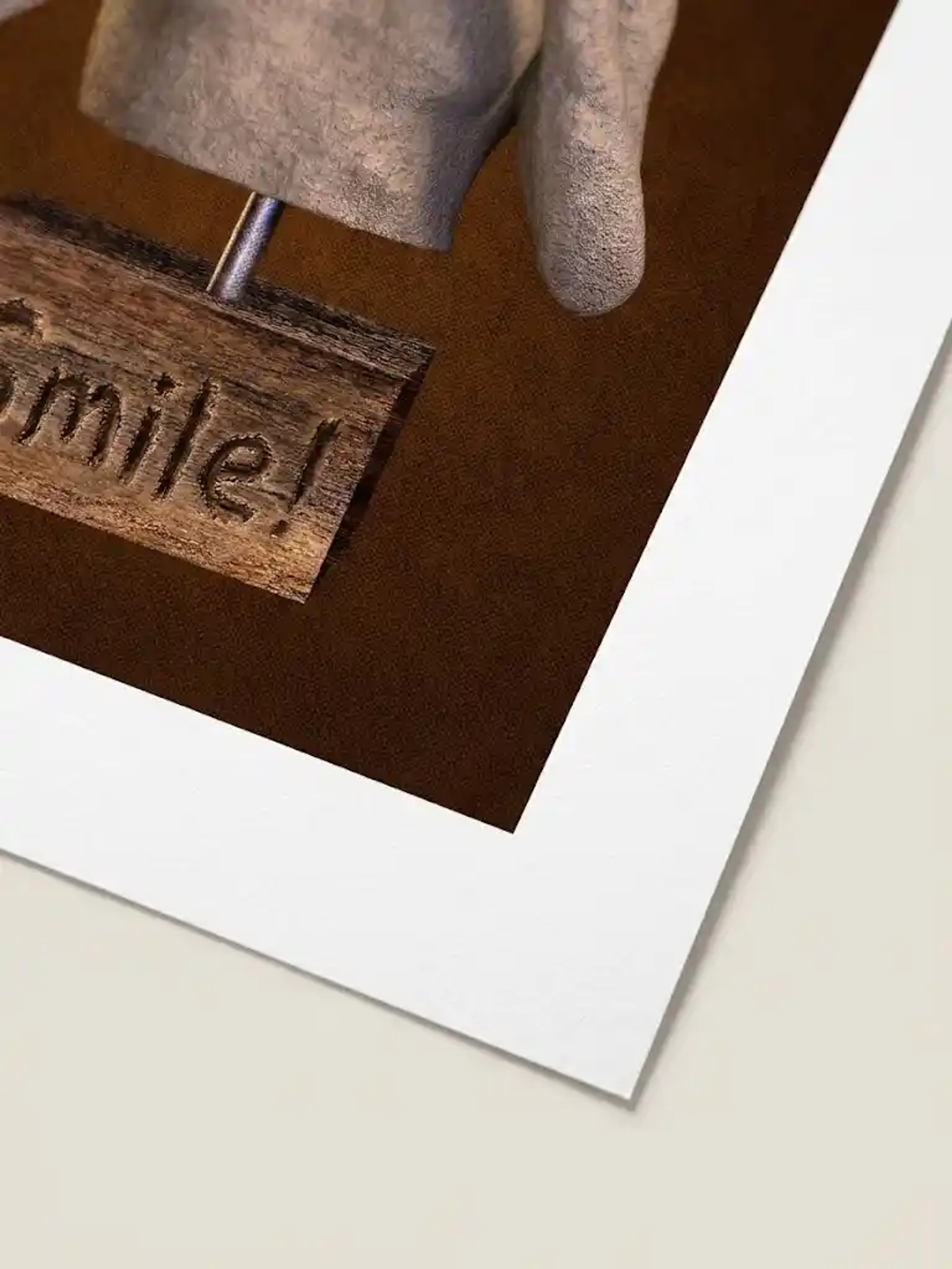 Digital sculpture of a bust figure using both index fingers to force a smile, mounted above a wooden block reading Smile!