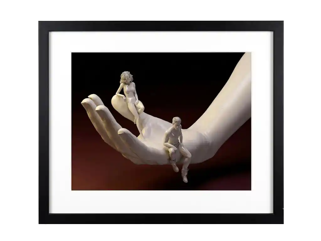 3D digital art of two small figures sitting in a large open hand against a dark red and black background.
