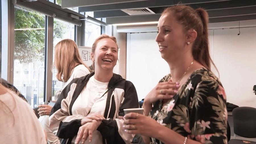 Two participants laughing during a TLH workshop