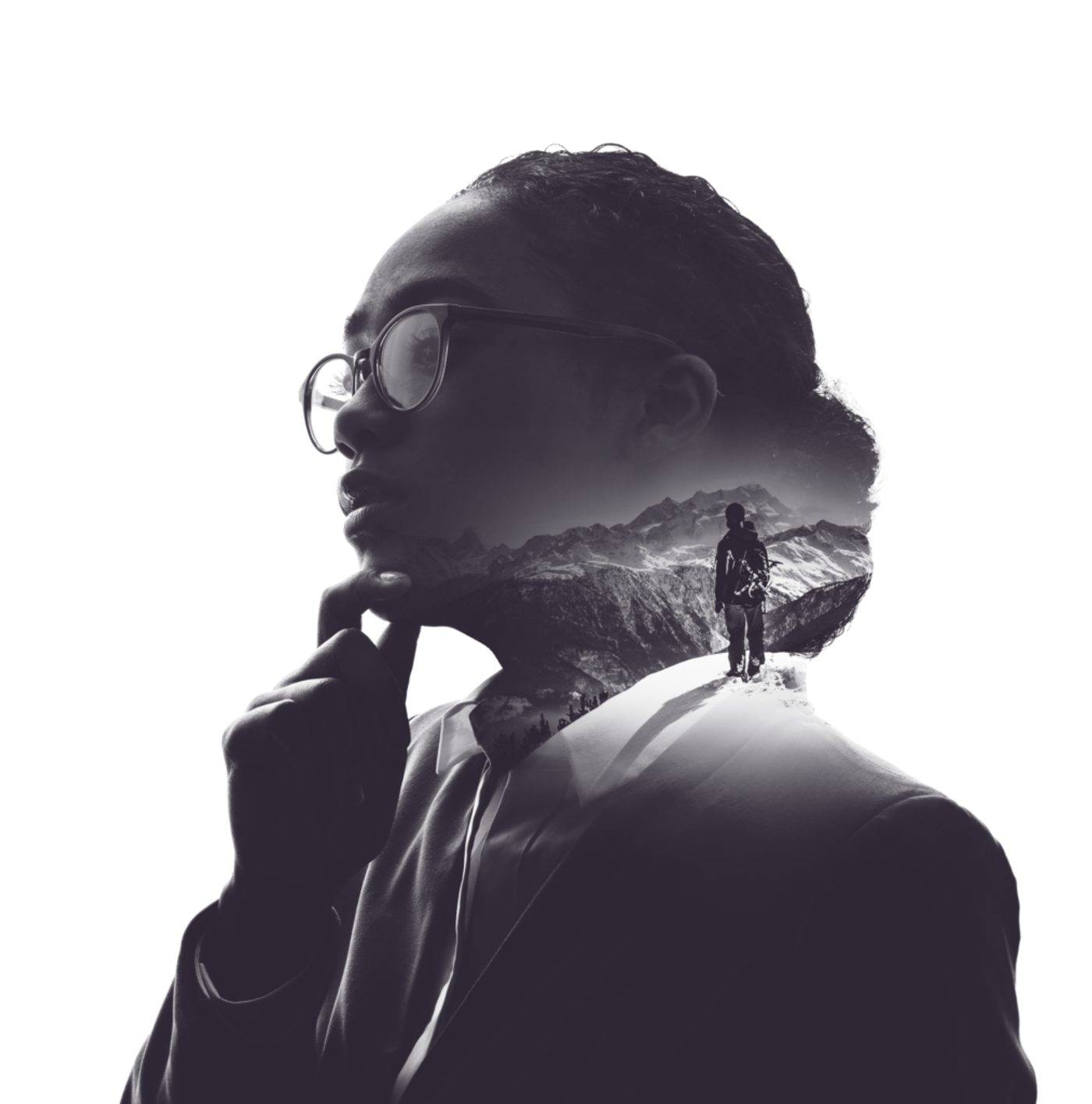 Double-exposure portrait of a woman in glasses, with a person on a mountain ridge inside her silhouette