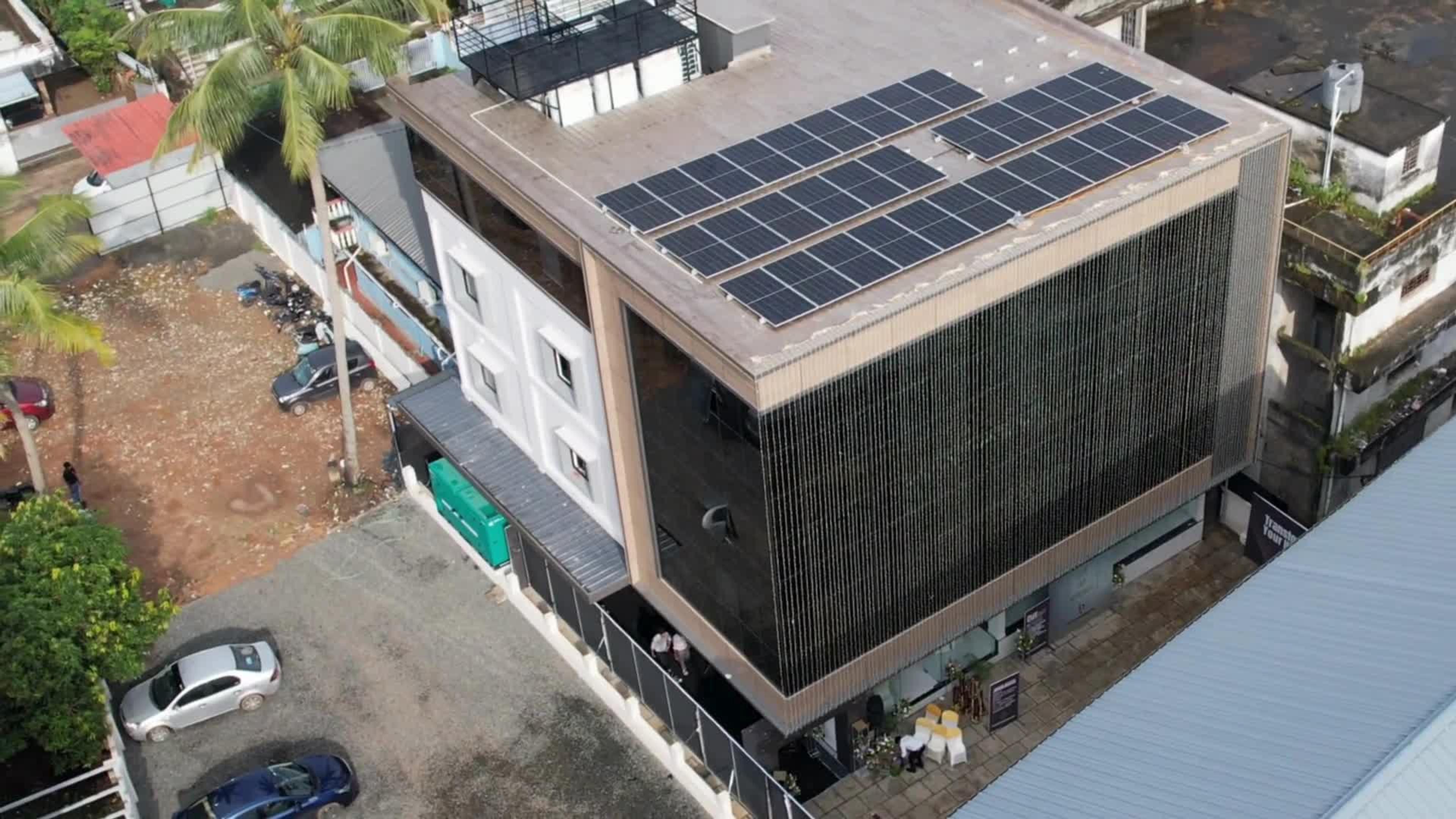 Aerial view of G K Tower, home of Covspace, with rooftop solar panels and parking