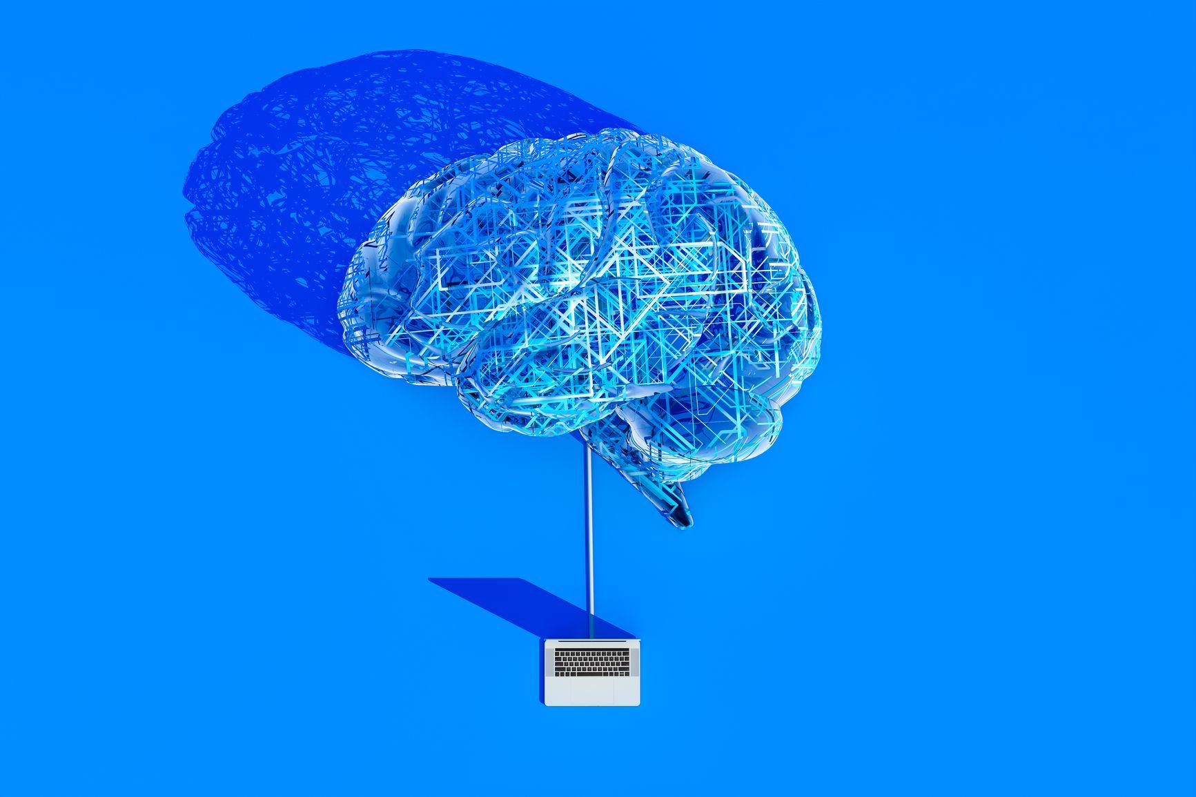 Illustration of brain as circuitry, connected to computer