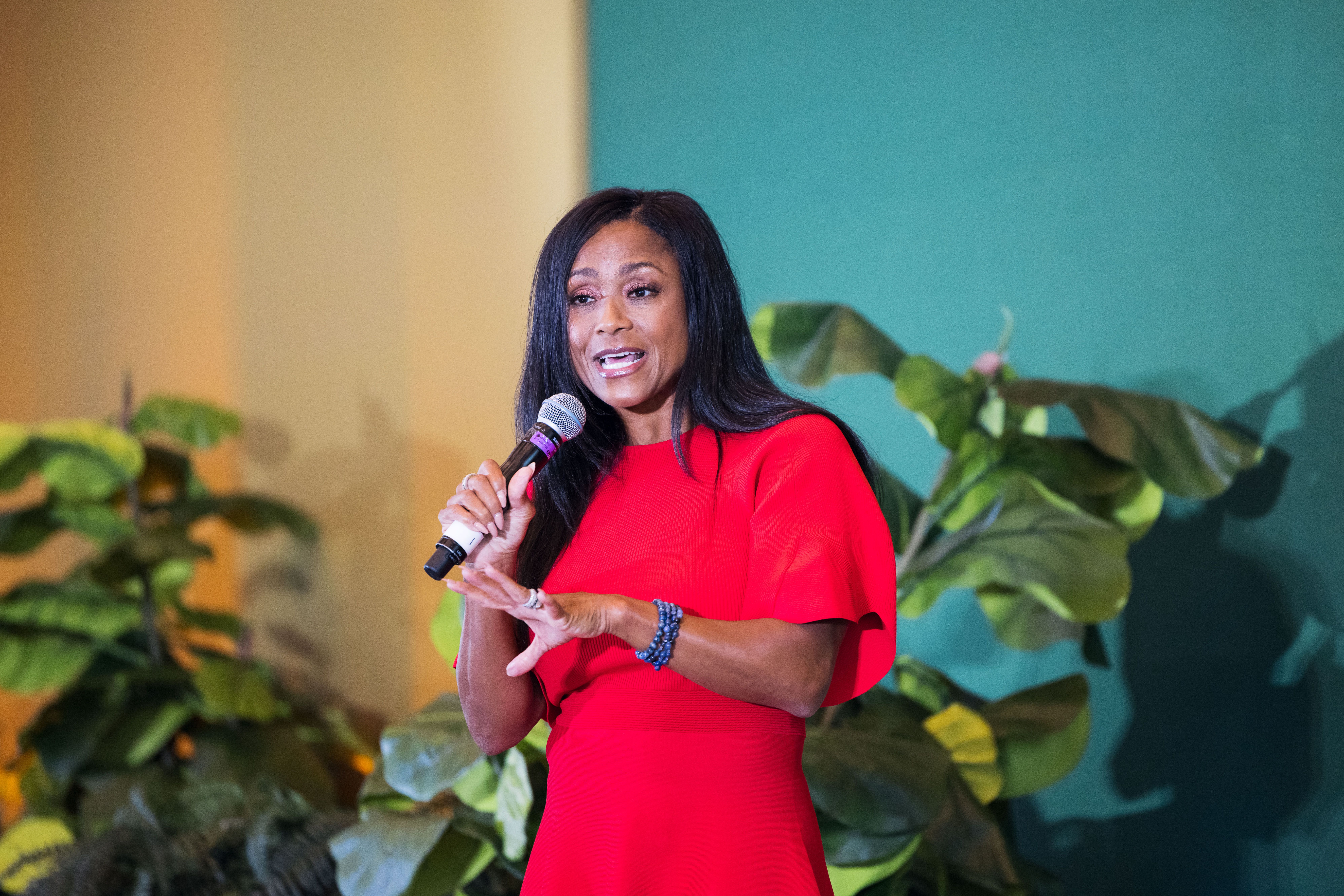 Dominique Dawes on stage at ChiefX
