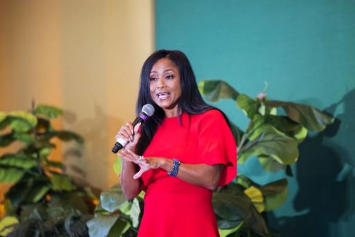 Dominique Dawes on stage at ChiefX