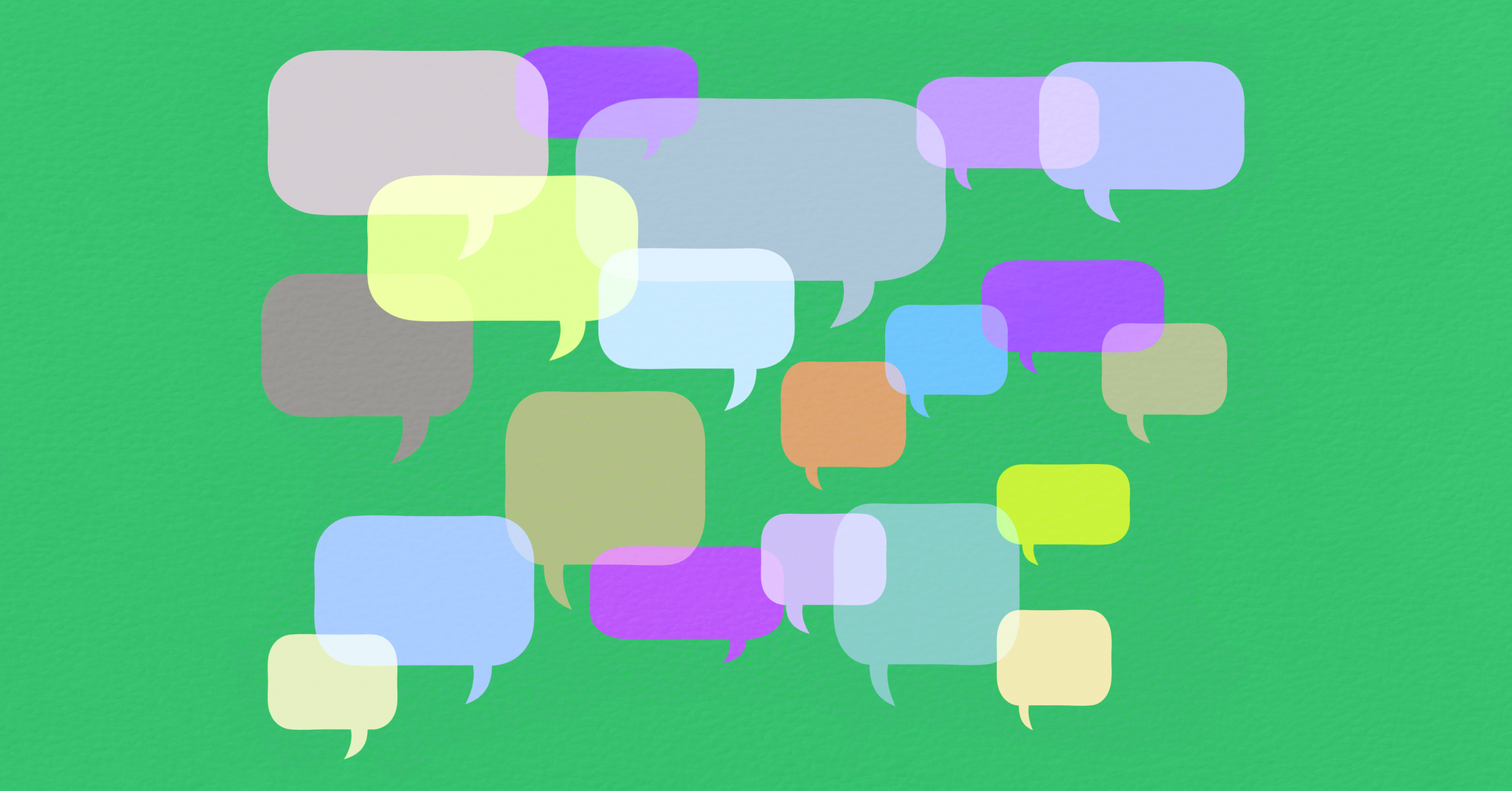 Image of different color speech bubbles on a green background. 