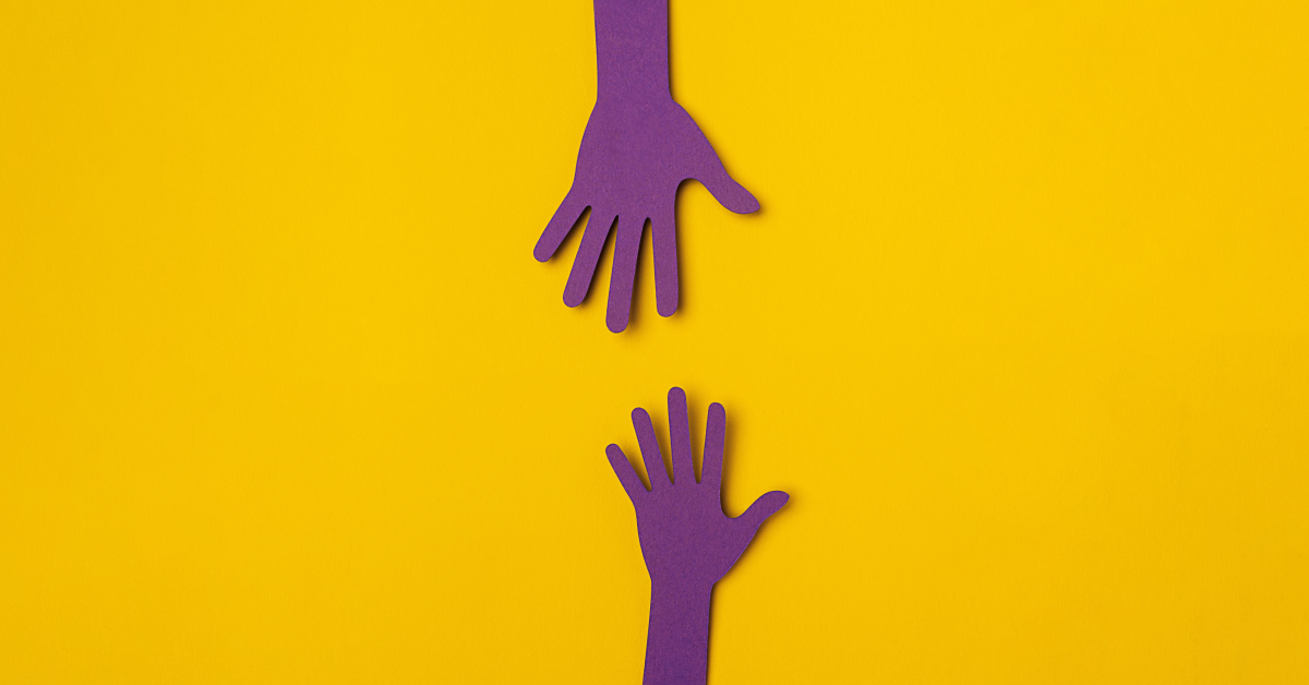 Two cut-out hands reaching for each other, implying one will raise up the other. 
