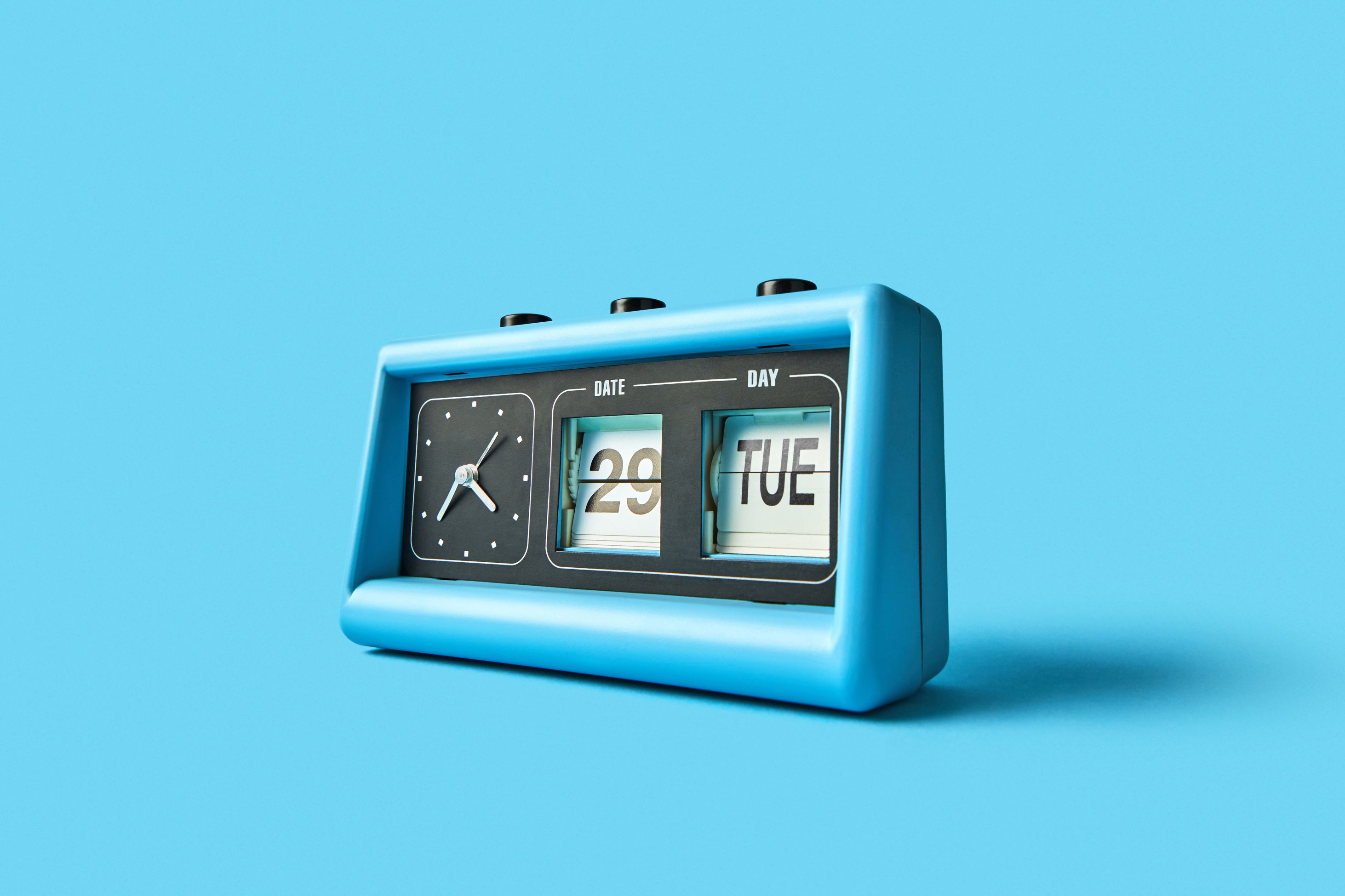 Image of a blue clock and calendar countdown. 