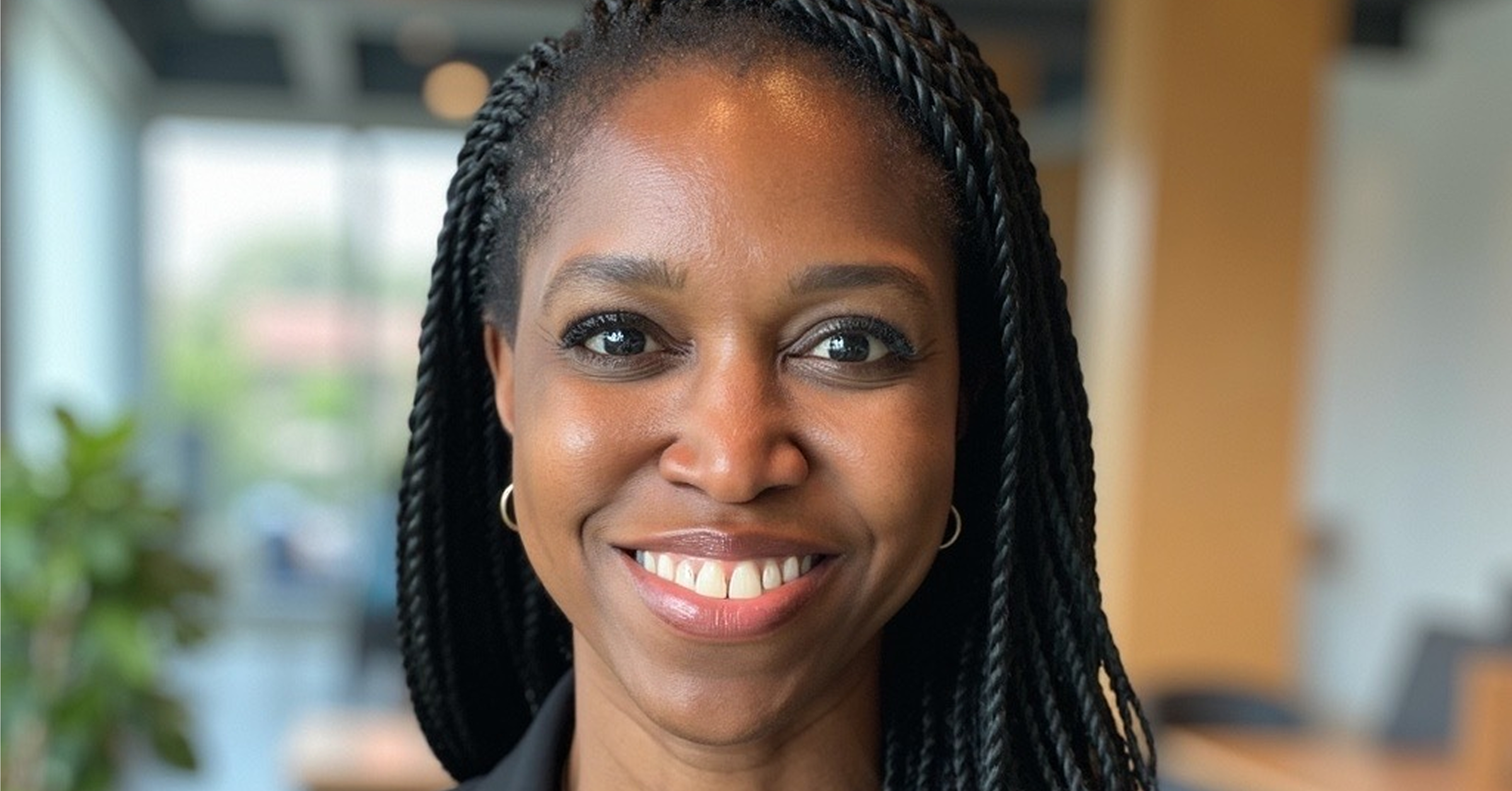 Headshot of Dr. Kudzai Dombo, prescribing physician at Alloy Health, board-certified OB/GYN, and menopause-certified specialist