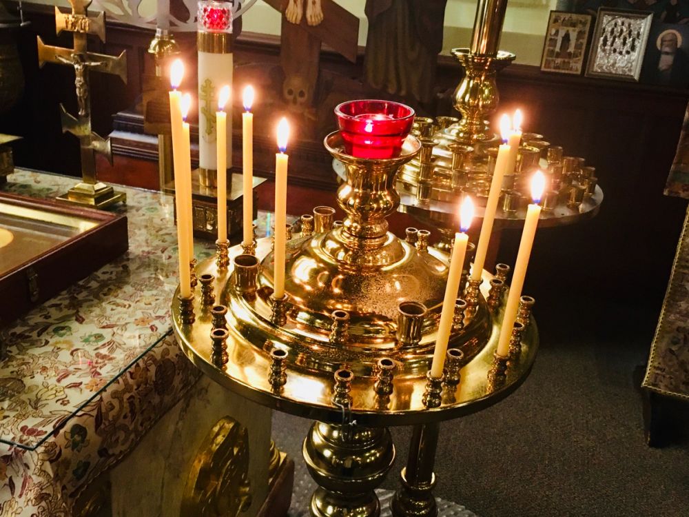 Candles burning before icons in an Orthodox church