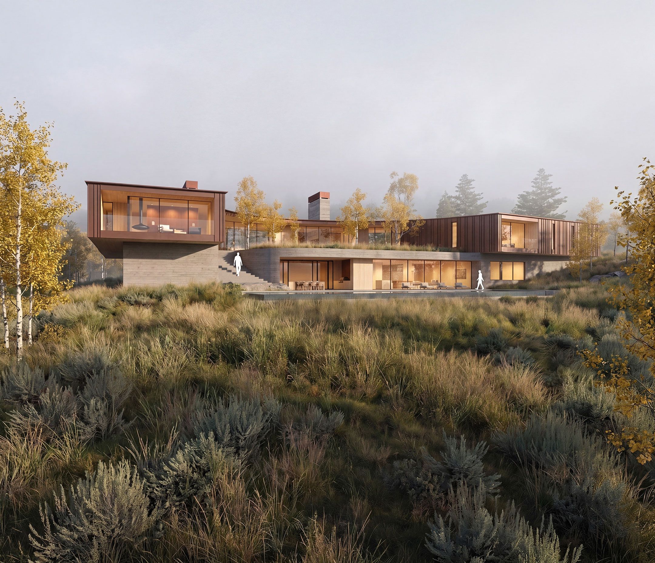 Modern two-story mountain home built into a grassy, brush-covered hill with large floor-to-ceiling windows and dark wood siding.