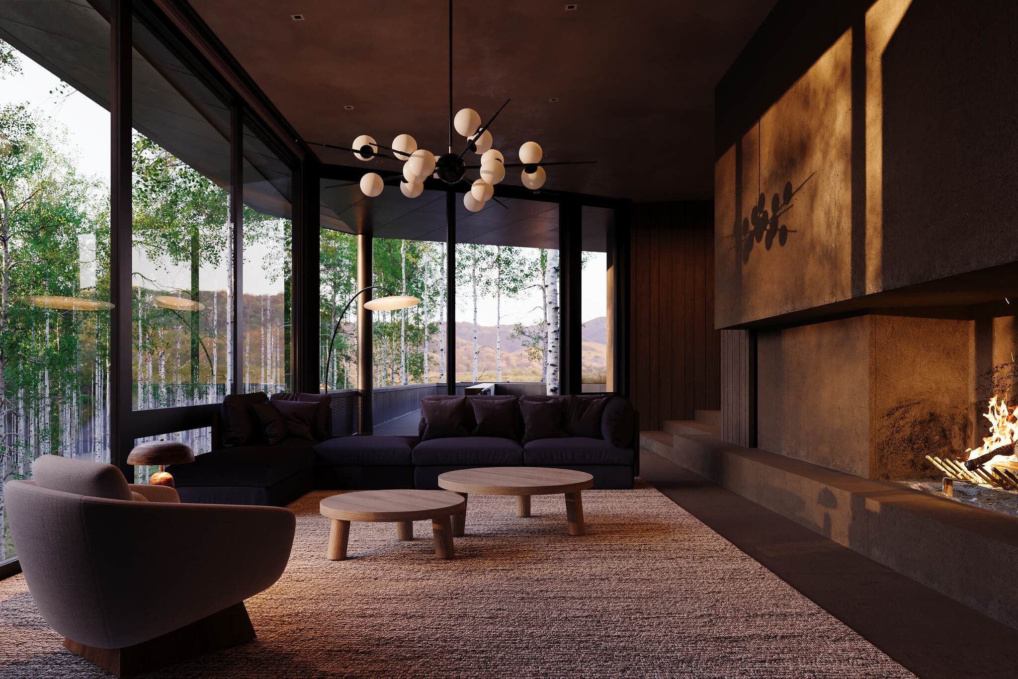 Contemporary living room with panoramic windows revealing a birch forest and mountains, featuring a sectional sofa, round coffee tables, a sputnik chandelier, and a cozy fireplace with warm light and tree shadows on concrete walls.