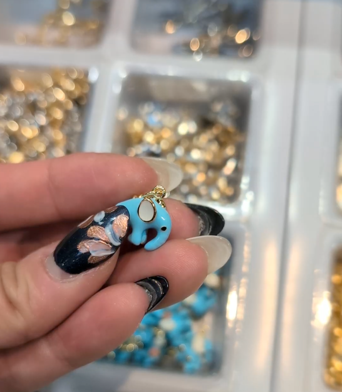 An elephant charm from a charm bar
