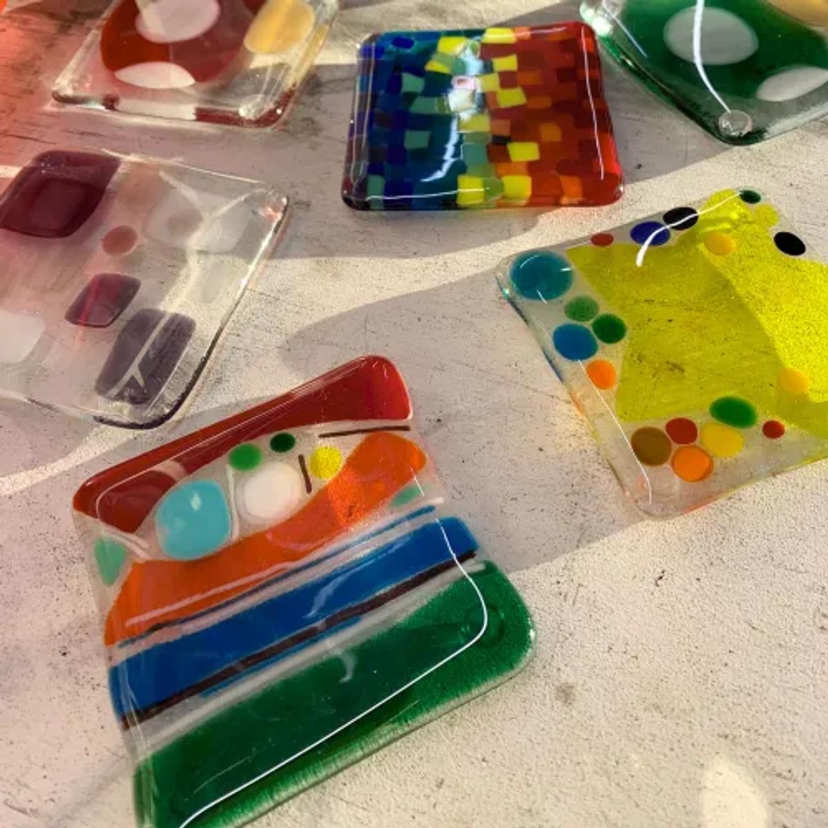 A set of fused glass coasters