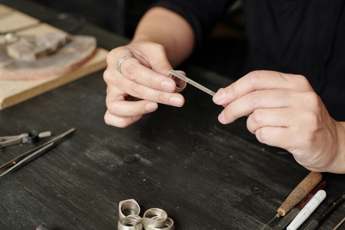 A silvery ring being created