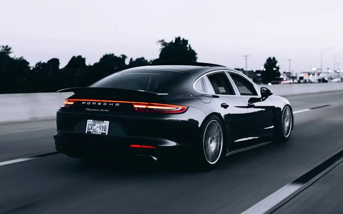 A car travelling along a highway at speed