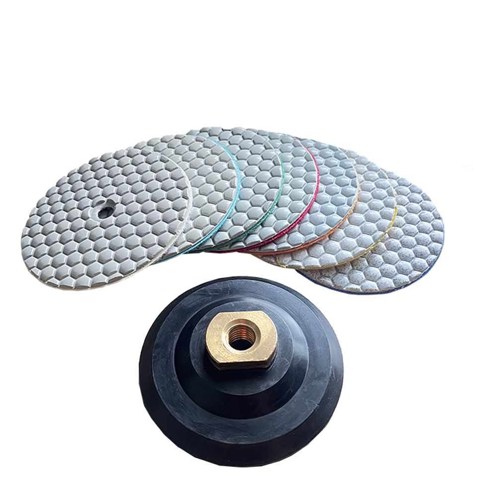Close-up of honeycomb diamond polishing pads showing the hexagonal geometric structure for efficient debris removal.