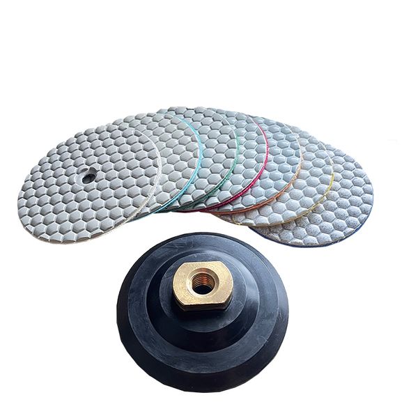 Close-up of honeycomb diamond polishing pads showing the hexagonal geometric structure for efficient debris removal.