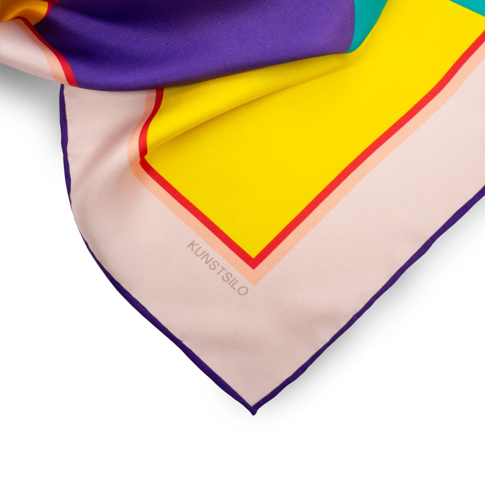 Corner detail of the Gundersen scarf showing the Kunstsilo label and hand-rolled edge