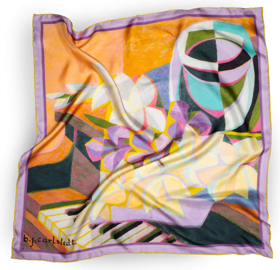 The Carlstedt Stillife silk scarf — Stina Carlstedt’s Nordic modernist still life in orange, lavender and green, draped with the "b.j.carlstedt." signature visible