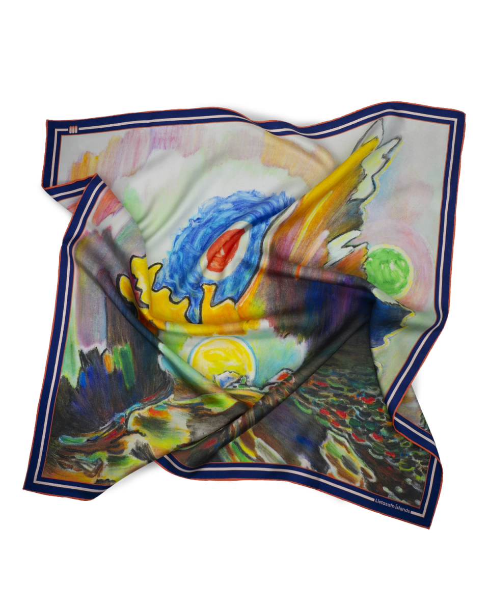 A Fiol silk scarf with an expressive, painterly print in vivid colour, edged in navy