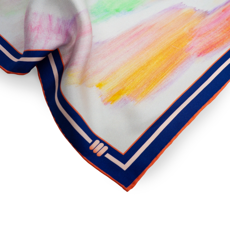 Corner detail of the Finnur Jónsson scarf — pale, watercolour-like passages and the gallery’s navy-and-orange border with its three-arch motif