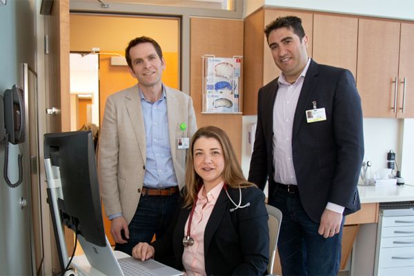 Dr. Jeff Greenberg, Dr. Nisha Basu and Dr. Andy Ellner in an office setting