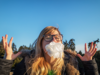 Female angry outside, tissue in face hands are up