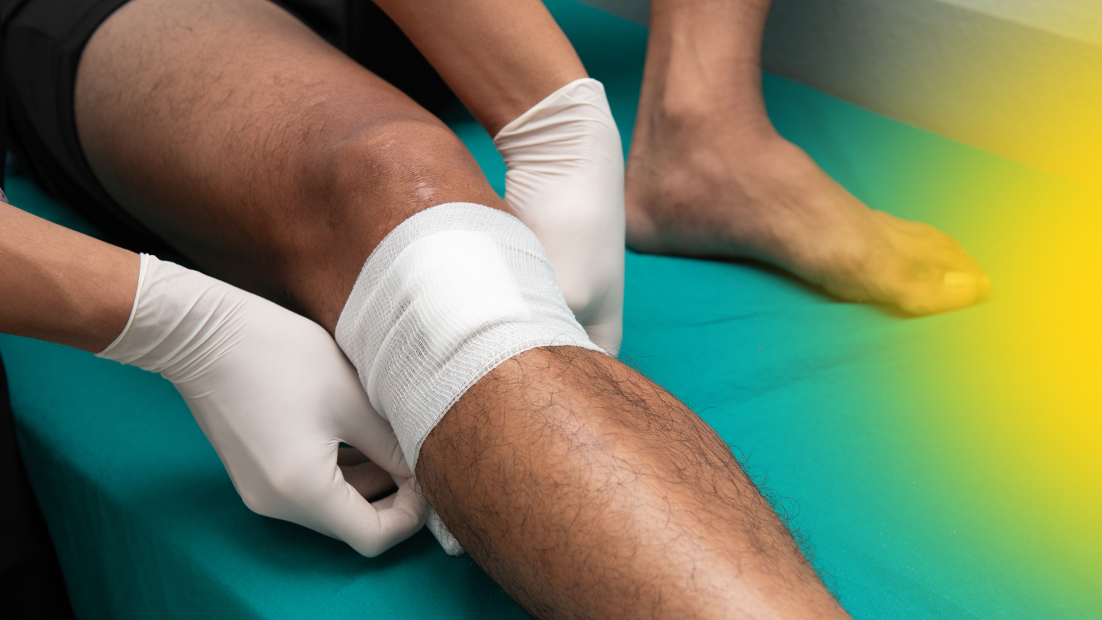 Man getting getting bandage on leg