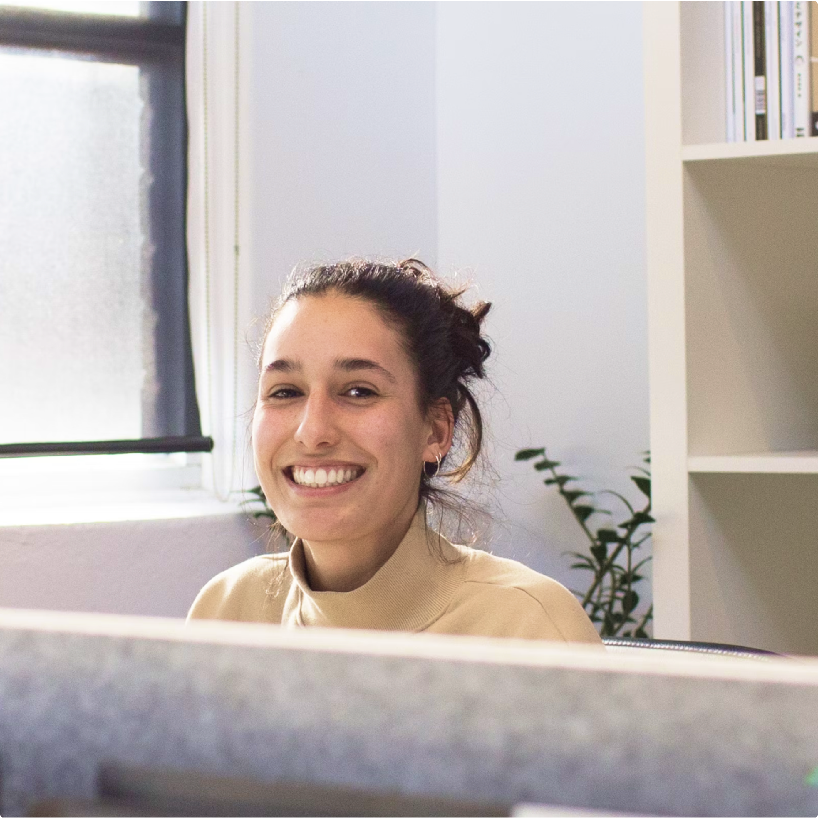 Laurel at her desk