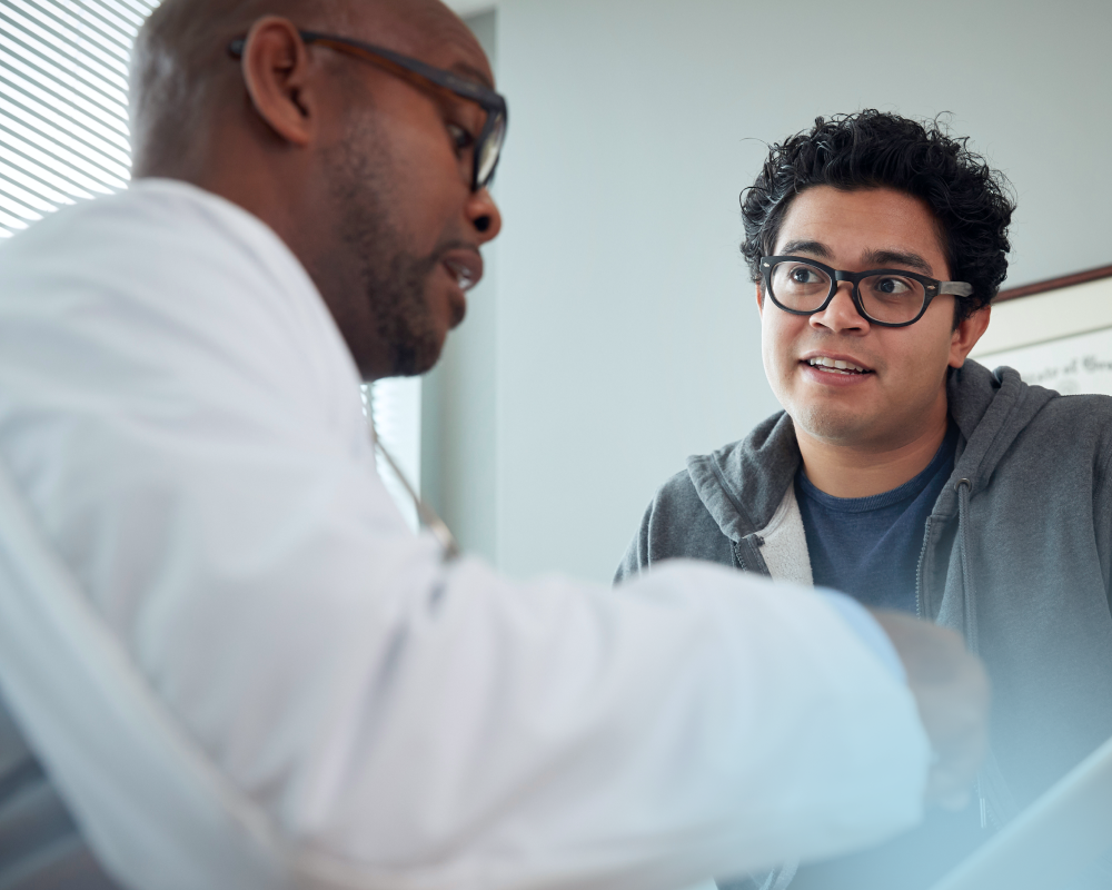 Doctor talking to a patient in a clinical setting