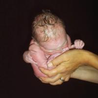 Birth story: “Sophie had a hand next to her head, yet I managed to give birth at home on my own!“