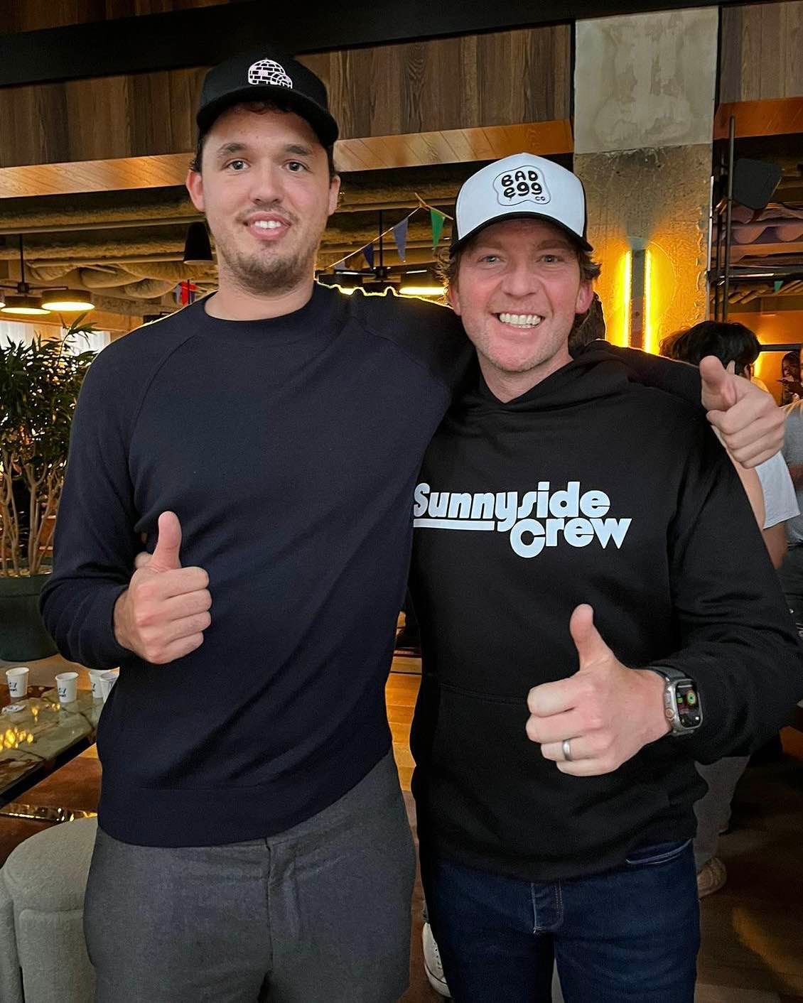 Person meeting Chief the penguin at EthCCWeek event.