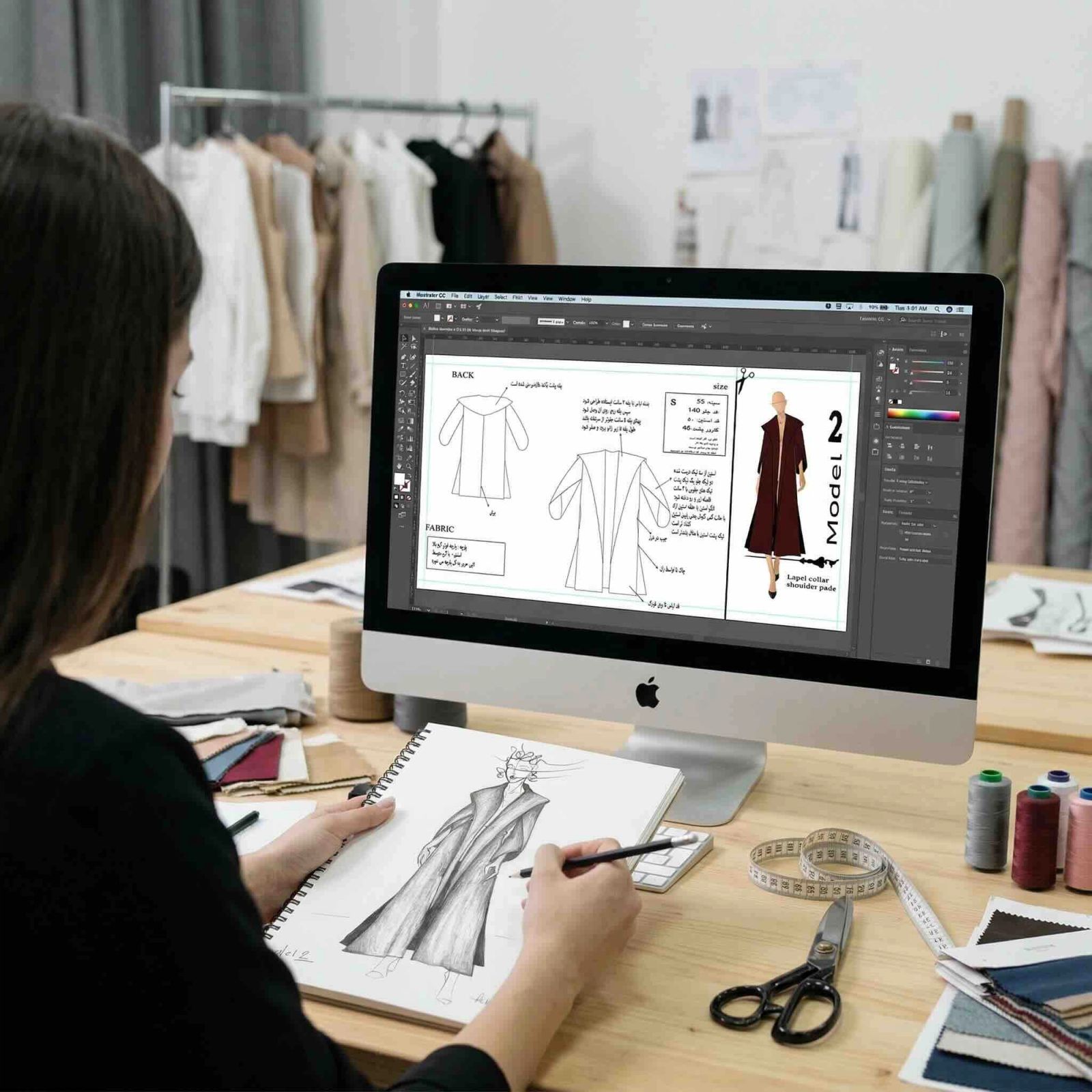 Fashion design workspace with sketches and development materials