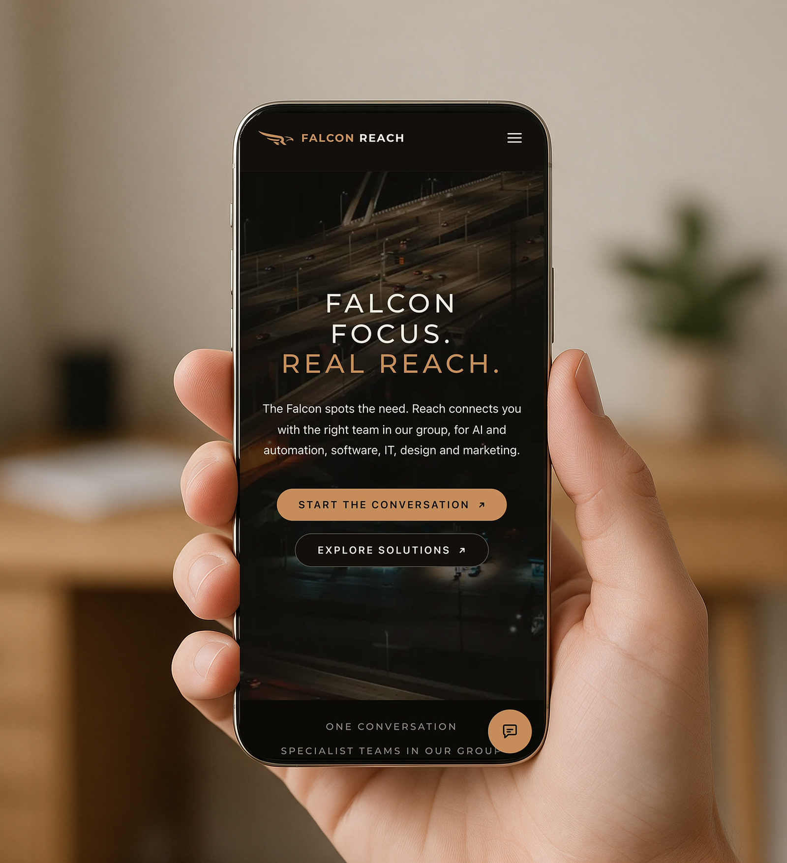 The Falcon Reach website on a phone: the hero, Falcon focus. Real reach.
