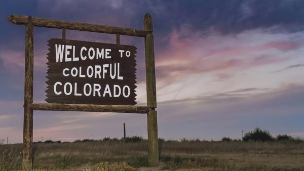 Road sign welcoming travelers to Colorado