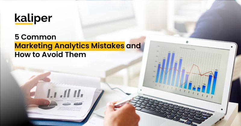 Blog header graphic titled "5 Common Marketing Analytics Mistakes and How to Avoid Them," showing a person reviewing printed bar and pie charts beside a laptop displaying a colorful bar-and-line performance chart.