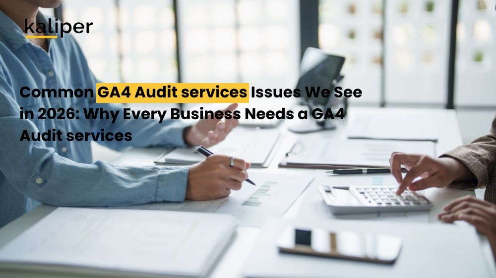 Blog header graphic titled "Common GA4 Audit services Issues We See in 2026," showing two people at a table reviewing printed reports with a calculator and tablet.