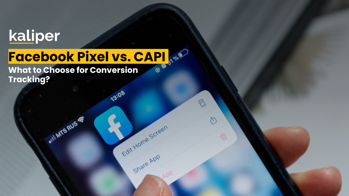 Blog header graphic titled "Facebook Pixel vs. CAPI: What to Choose for Conversion Tracking?," showing a hand holding a smartphone with the Facebook app open on its home screen.