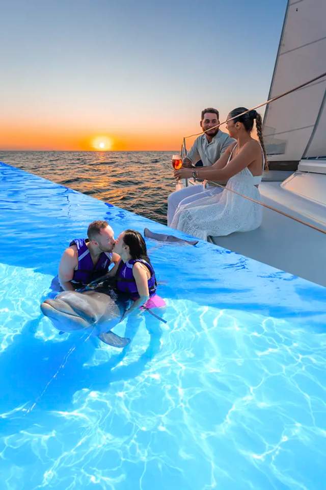 Puerto Vallarta Adults-only Tour package combining a Sunset Cruise and a Dolphin Swim.