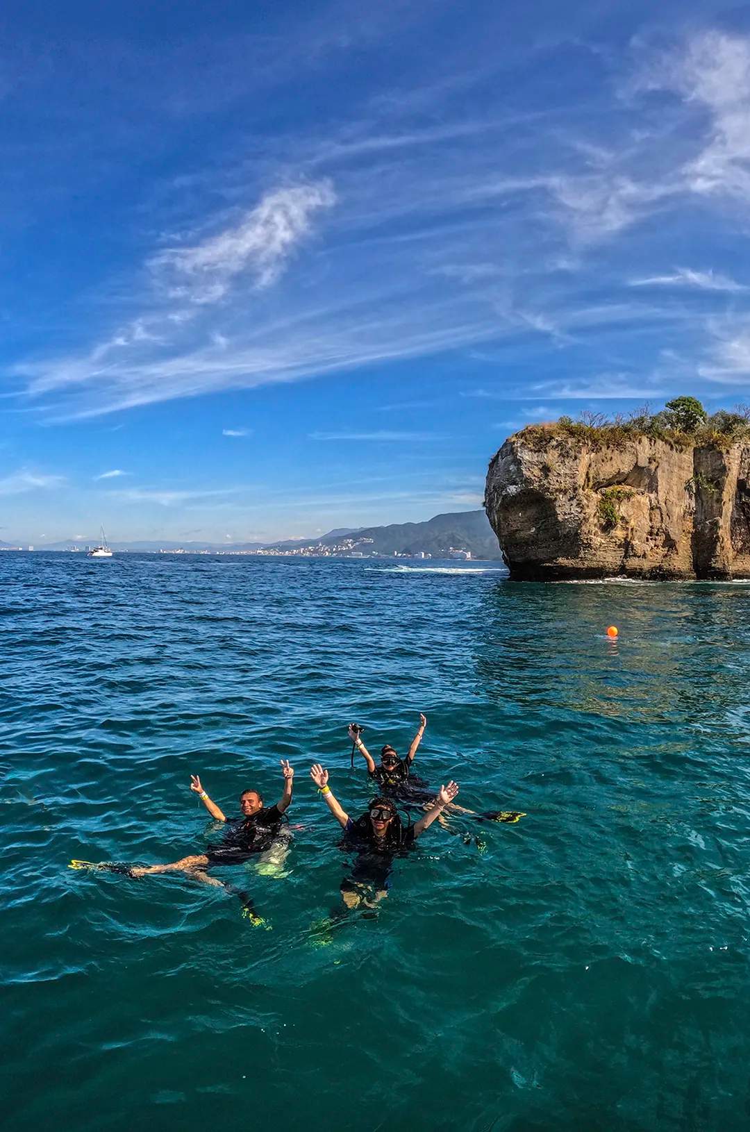 Aerial view of a group of scuba divers at the National Park Los Arcos Puerto Vallarta.