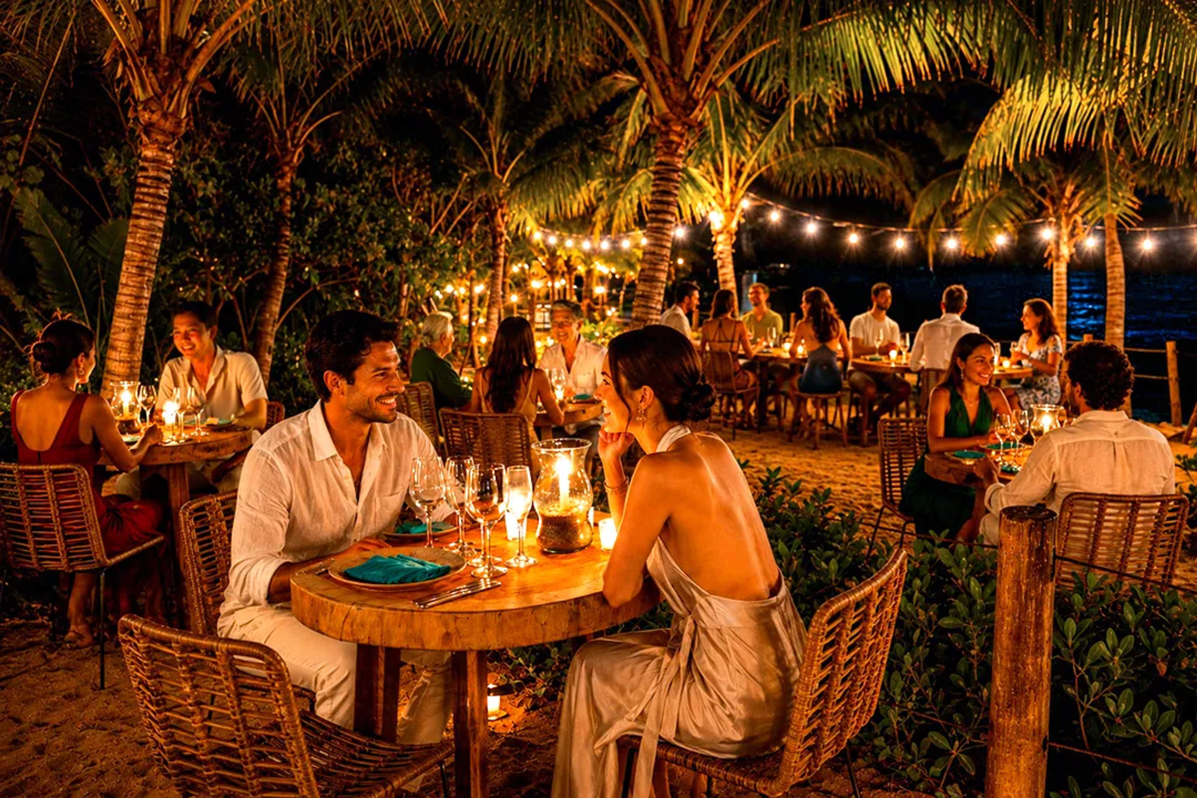Cena romántica frente al mar en Puerto Vallarta con gastronomía gourmet, velas y ambiente tropical.